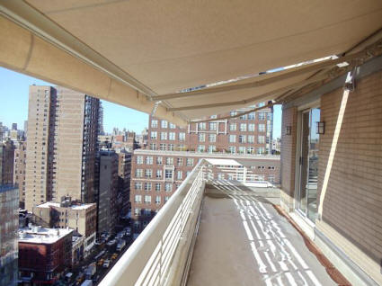 Extended retractable awning on Penthouse