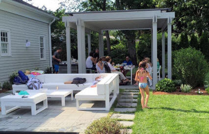 Party under shaded pergola