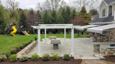 Patio with 2 retractable awnings and Pergola